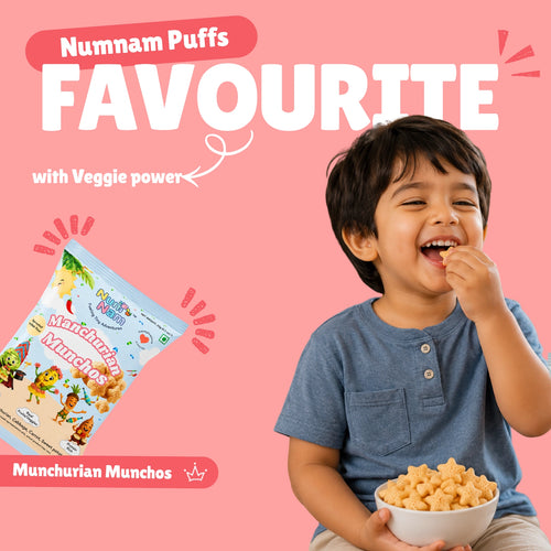Happy toddler eating Manchurian Munchos baked puff snacks with Num Nam Manchurian Munchos bag and Numnam Puffs Favourite banner