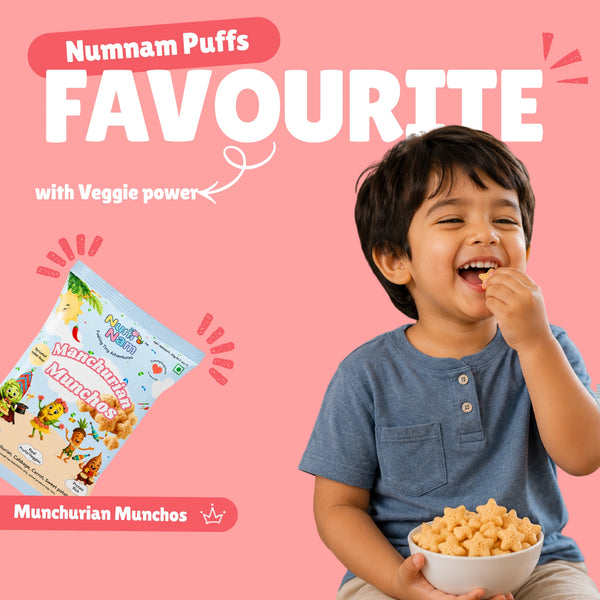Happy toddler eating Manchurian Munchos baked puff snacks with Num Nam Manchurian Munchos bag and Numnam Puffs Favourite banner