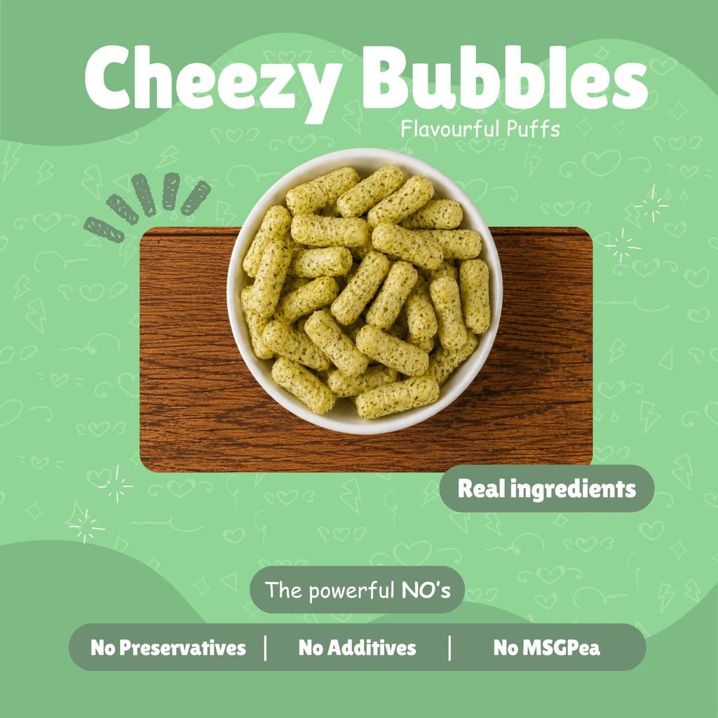 Bowl of Cheezy Bubbles baked millet puff snacks on a wooden board — Real Ingredients, No Preservatives, No Additives, No MSG — on light green background