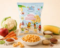 Num Nam Tikka Puffies packaging with puffed rings, vegetables and spices on a light background